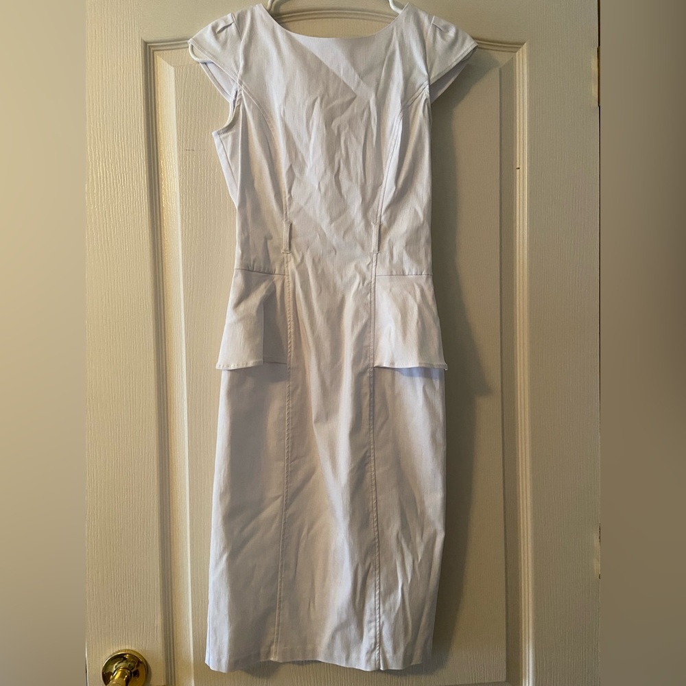 White dress with ruffles